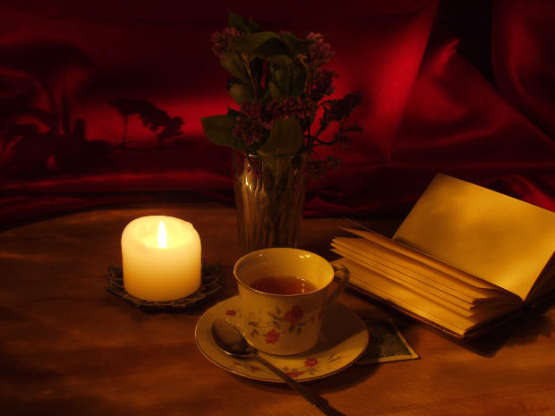 Book, tea and candle